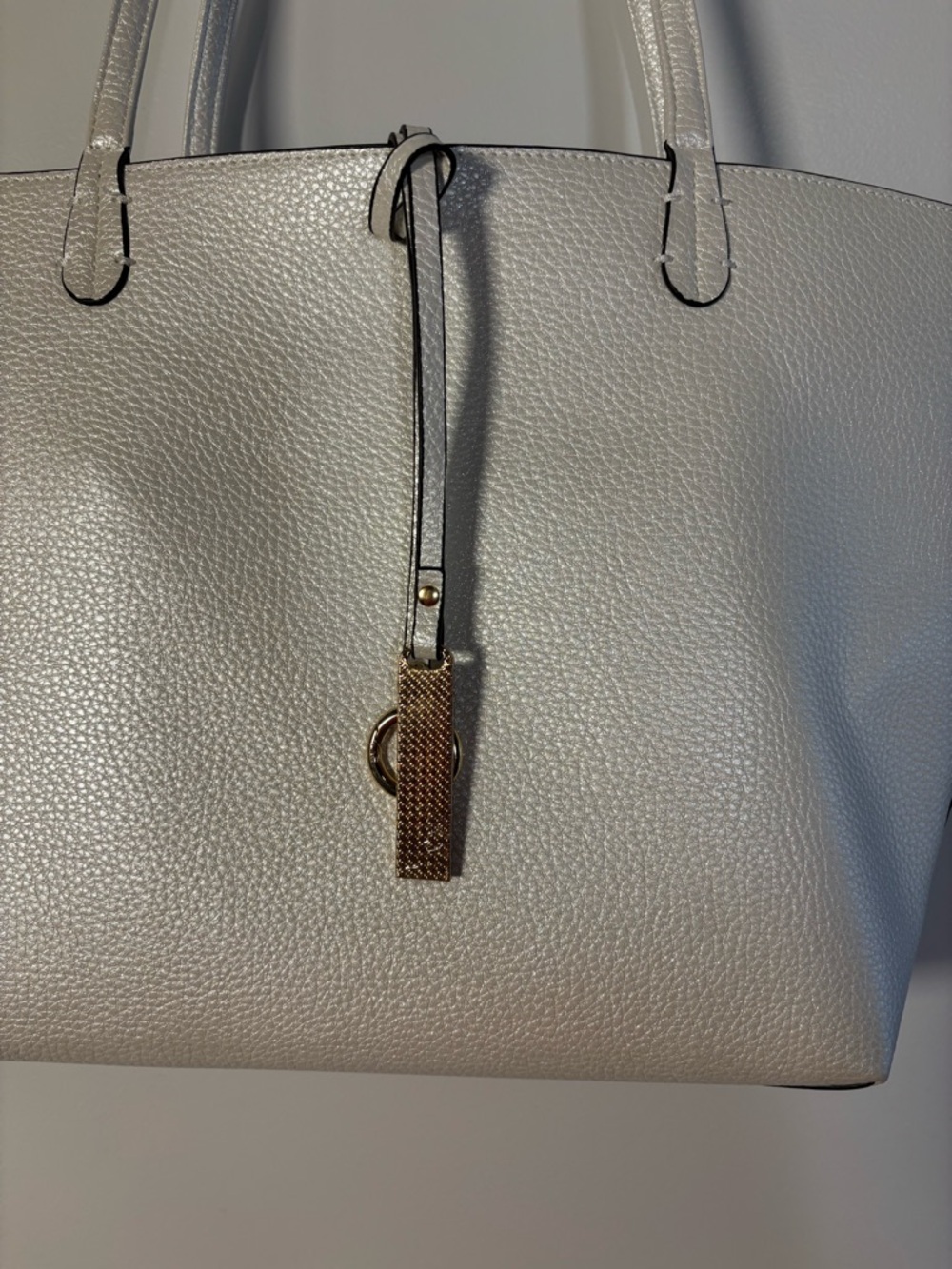 Kendra Reversible Vegan Leather Tote w/Gold Charm Accent Width 16” Length 10” - Picture 4 of 7